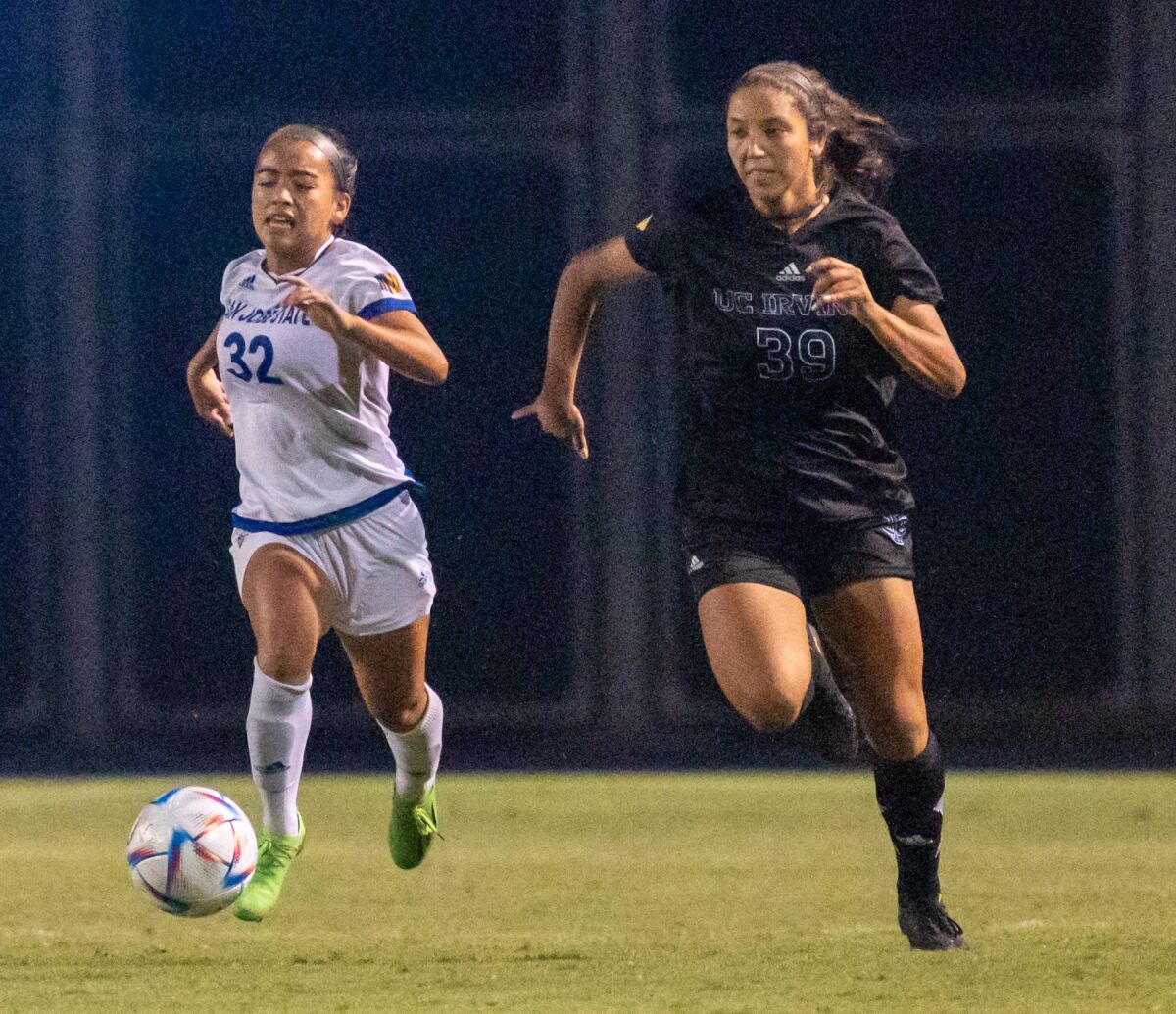 UC Irvine's Jenika Davis (39) runs toward the ball