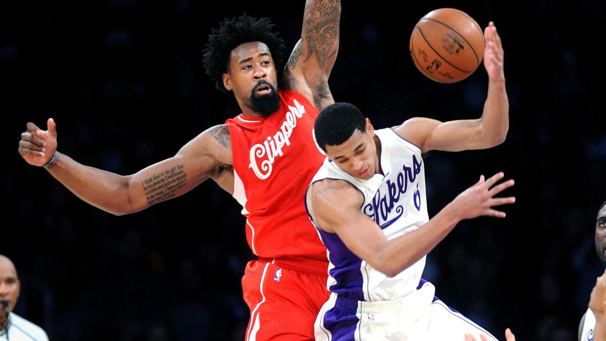 Clippers center DeAndre Jordan fouls Lakers guard Jordan Clarkson in a December game.