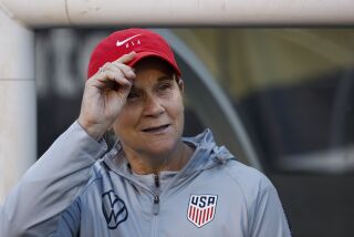 United States' Jill Ellis watches before during an international friendly soccer match against Portugal, Thursday, Aug. 29, 2019, in Philadelphia. (AP Photo/Matt Slocum)