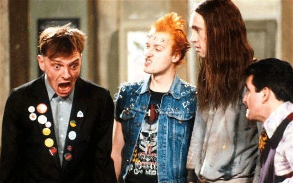 The actor didn't earn as many headlines in the U.S. as his native Britain, but comedy fans lost a uniquely twisted talent with his death last weekend. Briefly appearing in these shores in the manic '90s curio "Drop Dead Fred," Mayall is maybe best remembered as the leftist poet (far left above) in the strange and occasionally sick U.K. sitcom "The Young Ones," a show that united fans of British comedy and British punk while on MTV in the '80s. R.I.P., Rik.