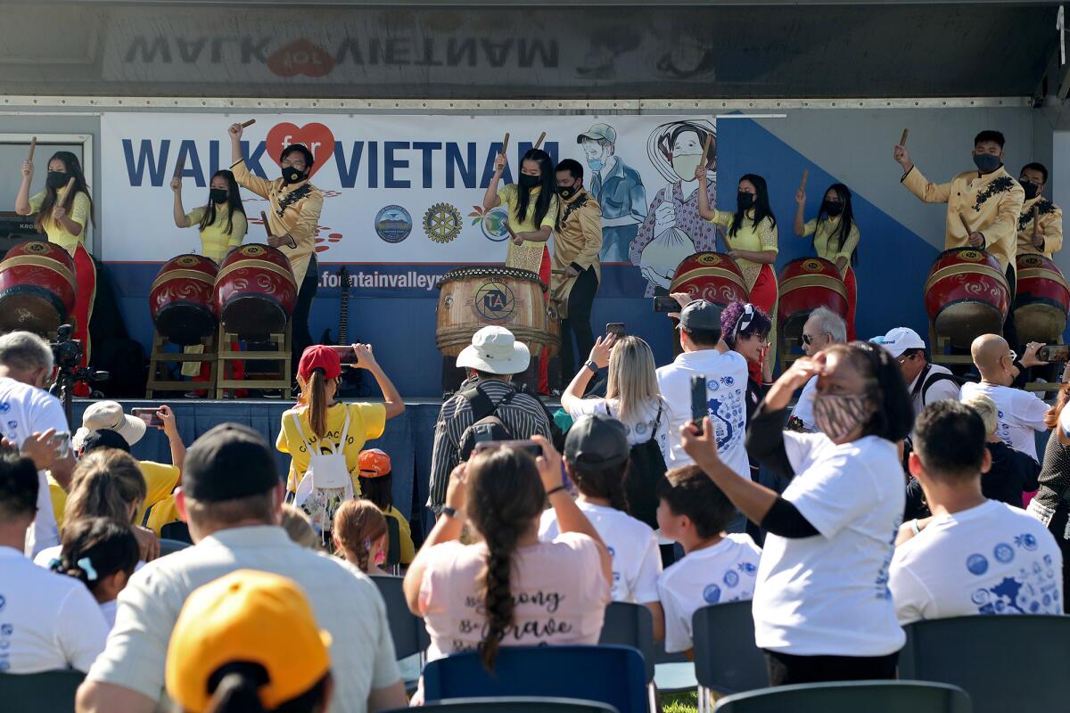 Thien An Performing Arts drummers entertain participants during the "Walk for Vietnam" event on Oct. 2 at Mile Square Park.