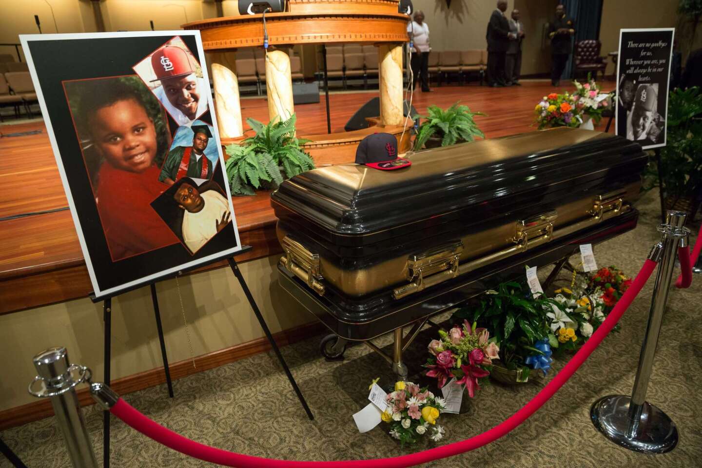 The casket of Michael Brown is viewed at Friendly Temple Missionary Baptist Church in St. Louis.