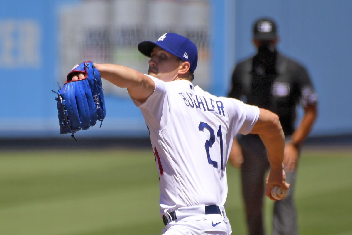 Los Angeles Dodgers starting pitcher Walker Buehler throws to the plate during the first inning of a baseball game against the San Francisco Giants Sunday, Aug. 9, 2020, in Los Angeles. (AP Photo/Mark J. Terrill)