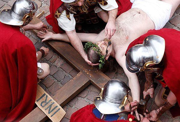 Actors in Bensheim, Germany, take part in a Good Friday reenactment of the crucifixion of Jesus.