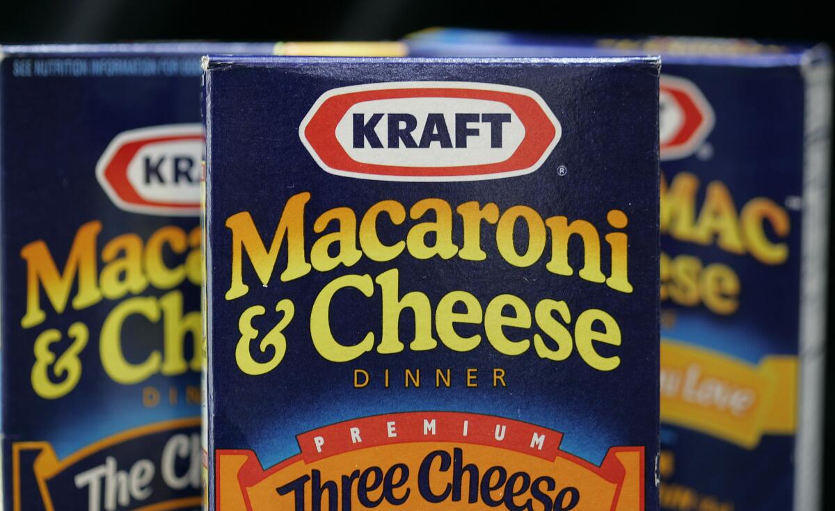 Boxes of Kraft Macaroni & Cheese. Kraft recently announced it would stop using synthetic dye in its macaroni and cheese products made in the U.S.