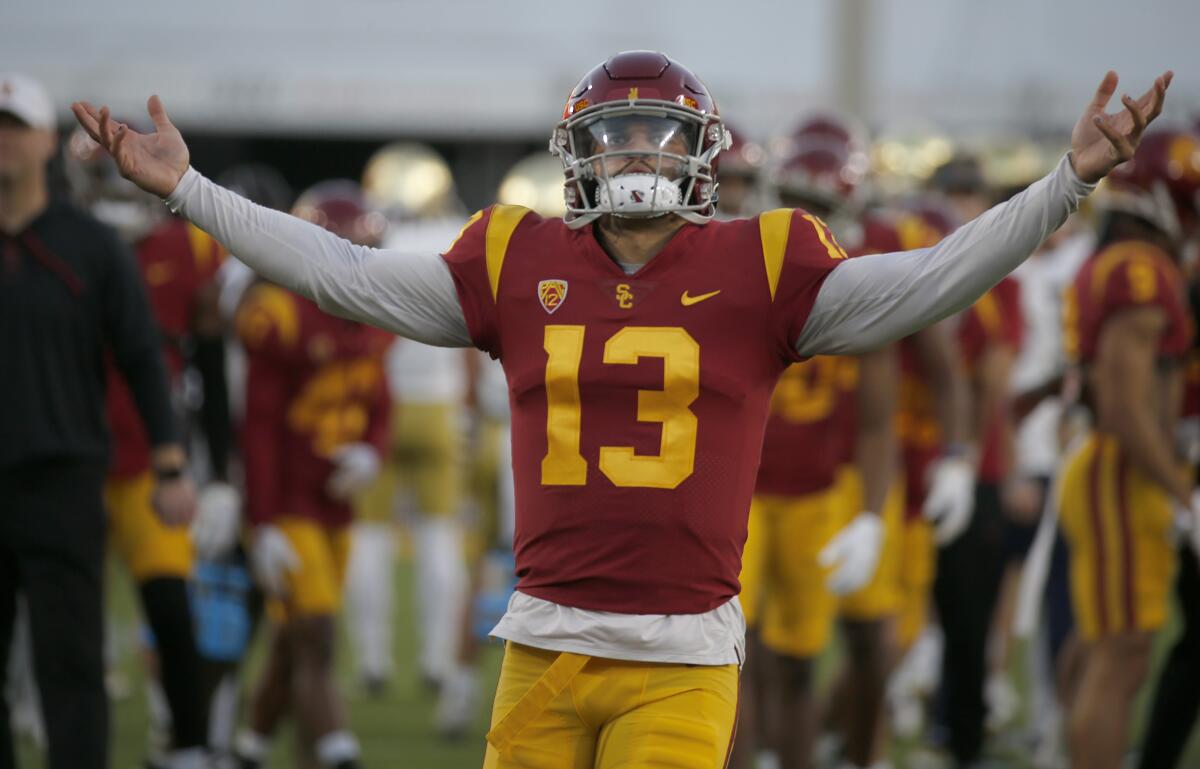 USC quarterback Caleb Williams warms up before playing Notre Dame in the storied football rivalry.