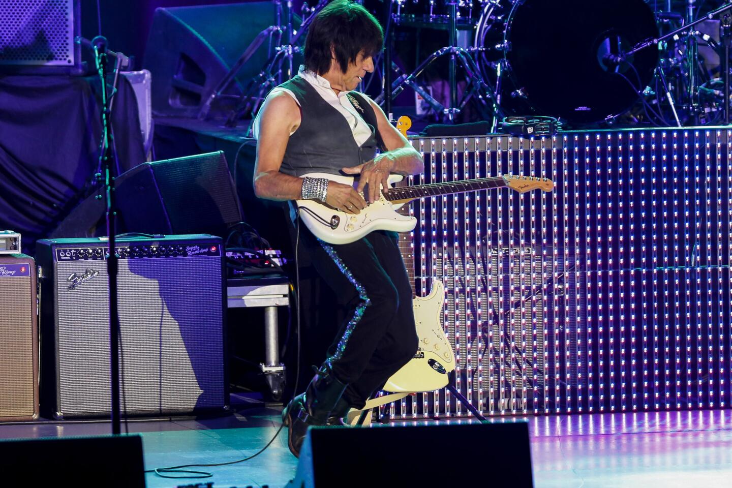 Guitar legend Jeff Beck mesmerizes concertgoers during his performance the Greek Theatre in Los Angeles on Oct. 20, 2013, where he shared a bill with Beach Boy Brian Wilson.