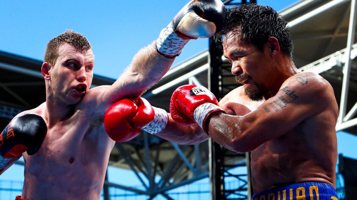 Jeff Horn goes on the offensive against Manny Pacquiao during their welterweight fight in