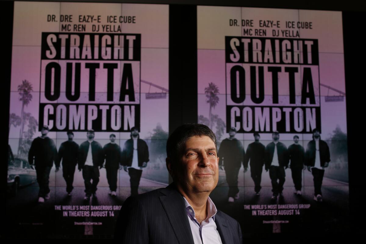 Jeff Shell is photographed in front of posters for Universal Pictures' hit musical biopic “Straight Outta Compton.”