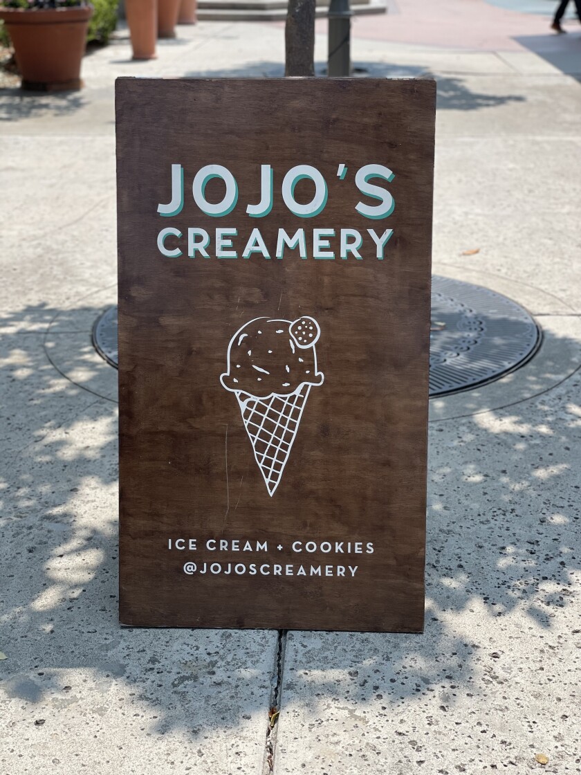 JoJo's Creamery shop sign and ice cream cone graphic