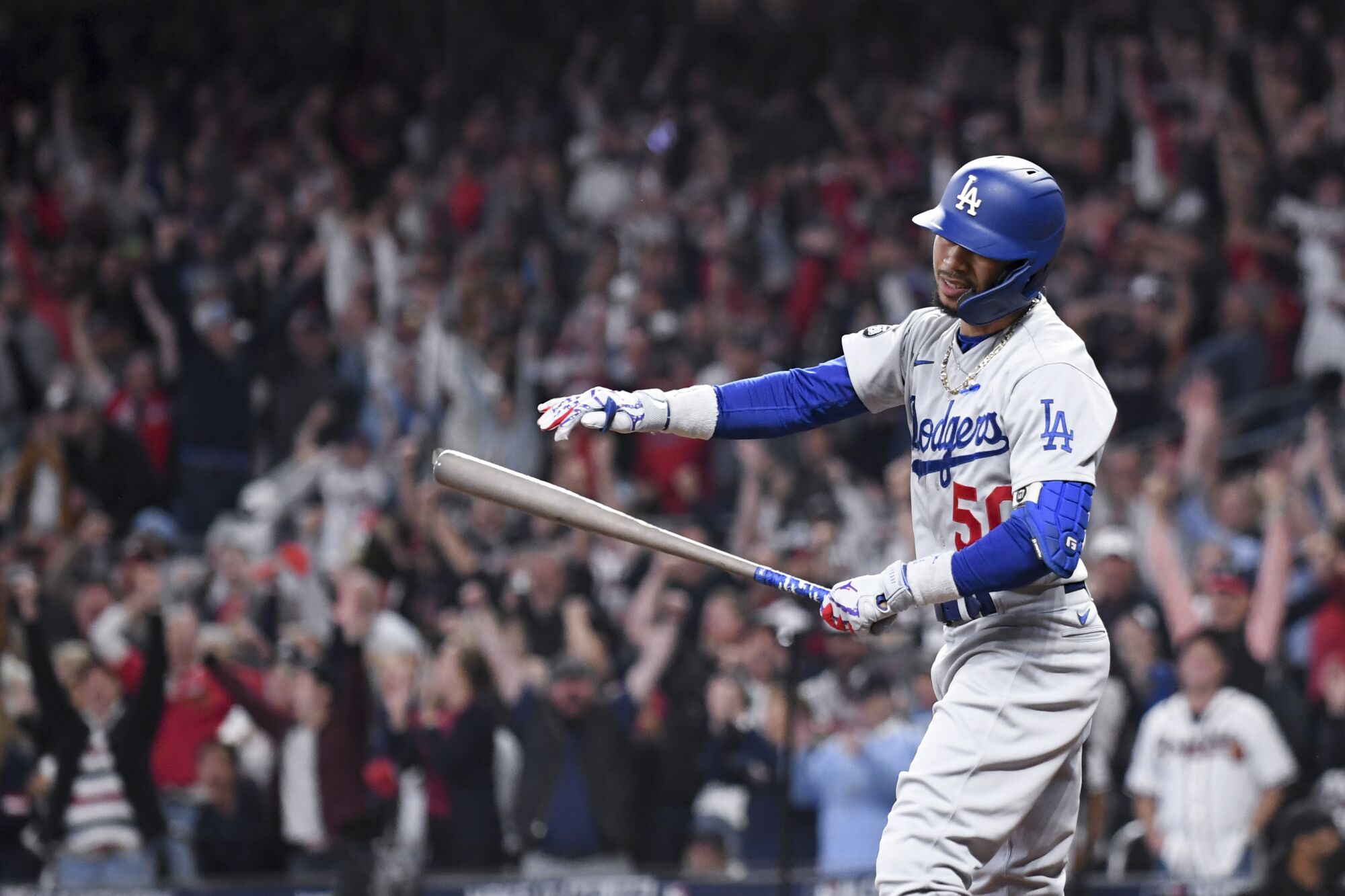 Dodgers right fielder Mookie Betts reacts after striking out during the seventh inning in Game 6 of the NLCS.