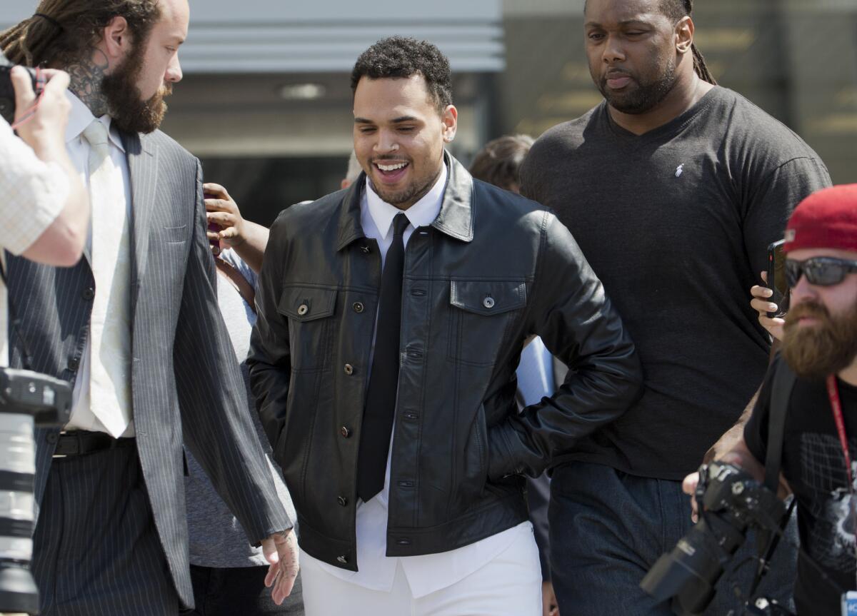 Singer Chris Brown leaves the D.C. Superior Court in Washington on June 25. He is charged with misdemeanor assault.
