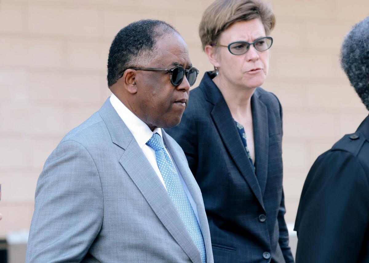 Mark Ridley-Thomas leaves court in downtown Los Angeles on March 27. 