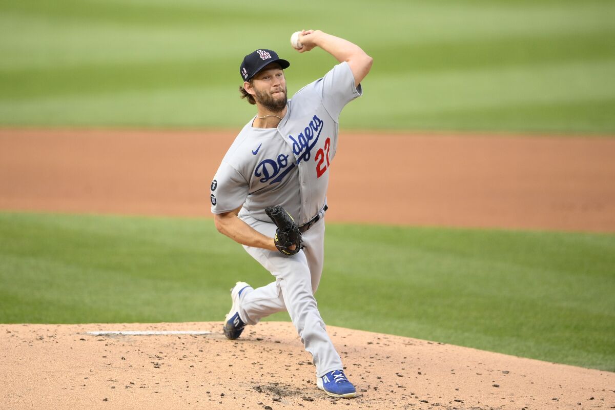 Los Angeles Dodgers starting pitcher Clayton Kershaw (22) delivers a pitch during the first inning.