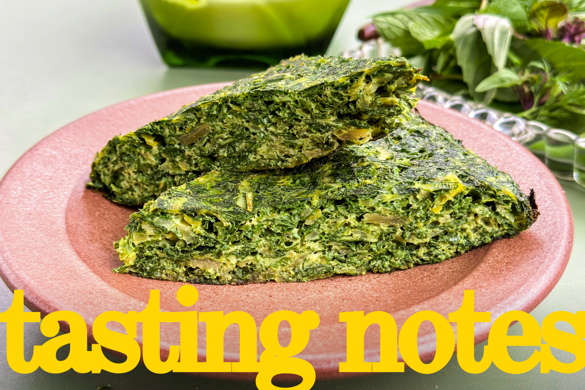 The Persian baked egg dish kuku sabzi is shown on a plate with the words 'tasting notes' in yellow