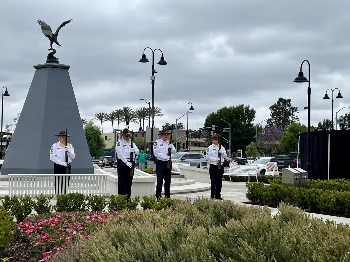 A 21-gun salute by American Legion Post 227 at Tustin’s Veterans Sports Park.