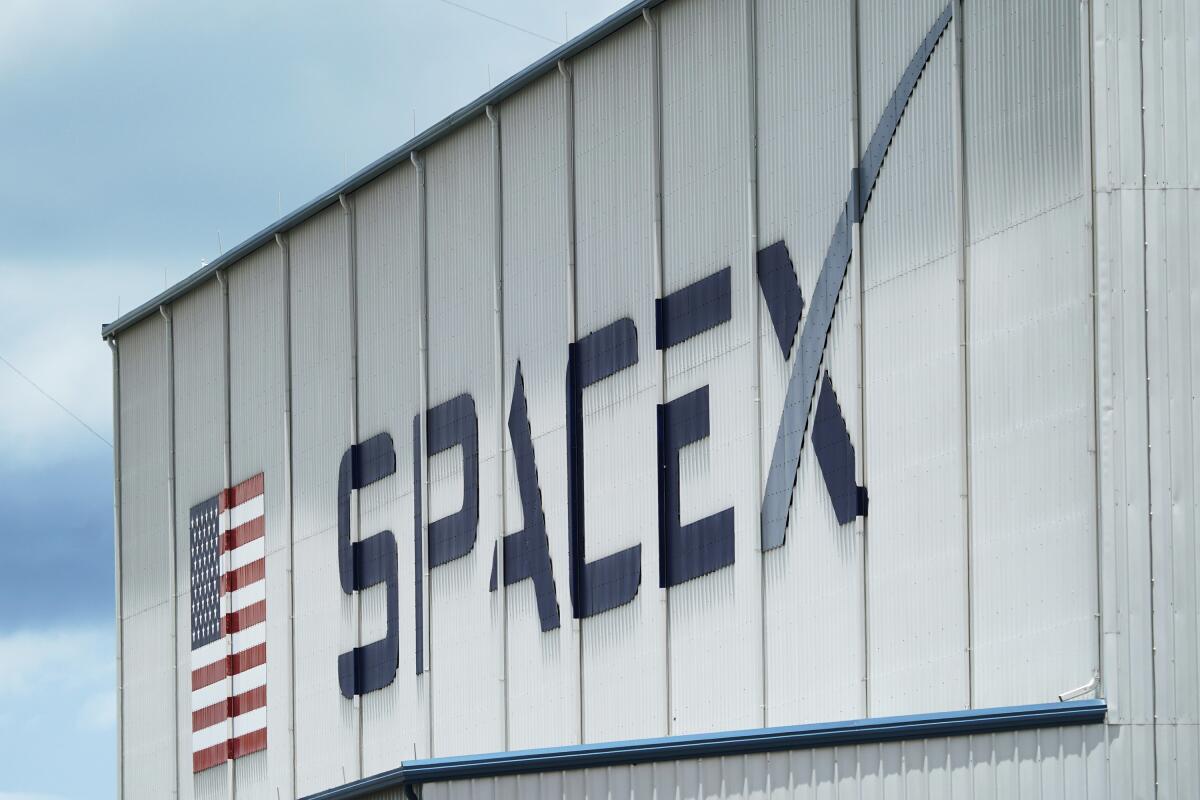The SpaceX logo on a building at Kennedy Space Center in Cape Canaveral, Fla. 