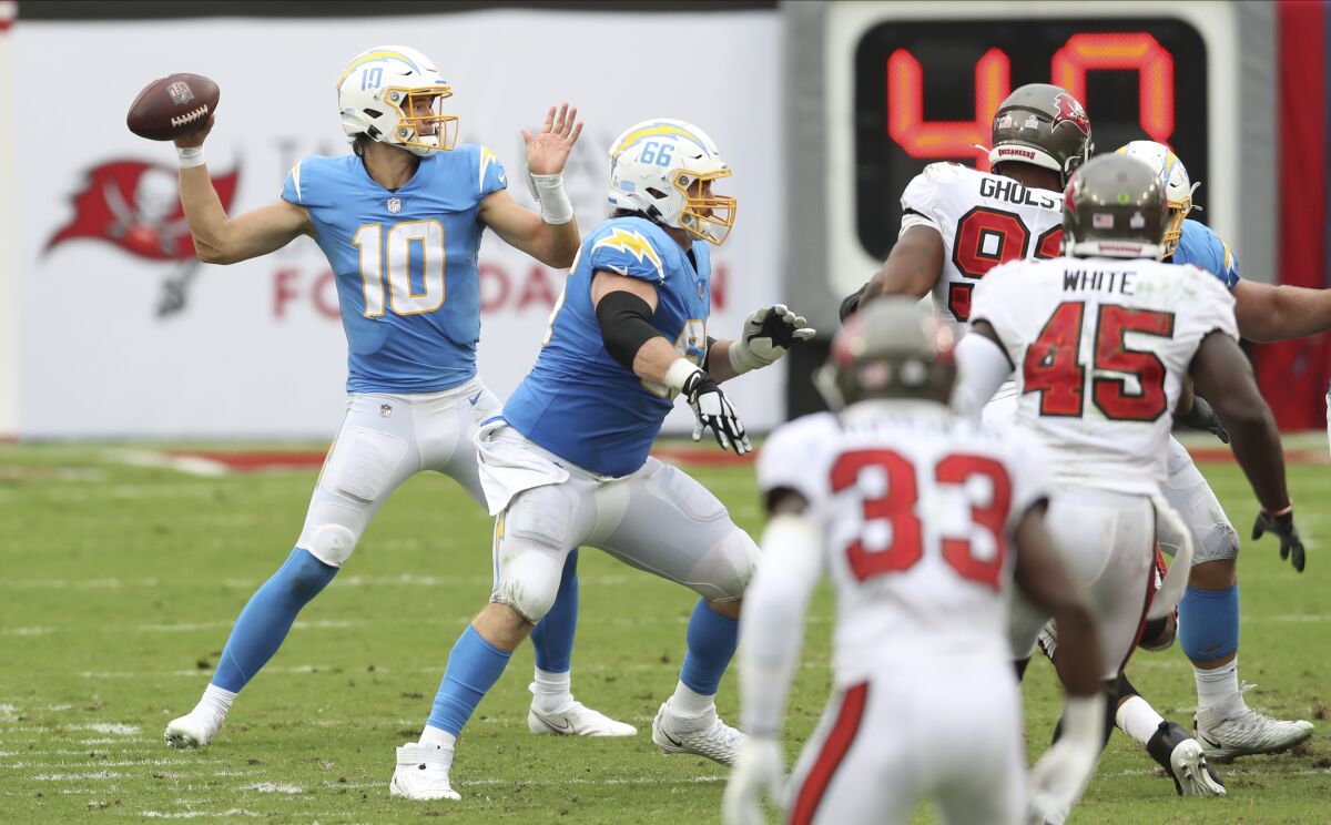 Chargers quarterback Justin Herbert passes against the Tampa Bay Buccaneers in the first half of Sunday's loss.