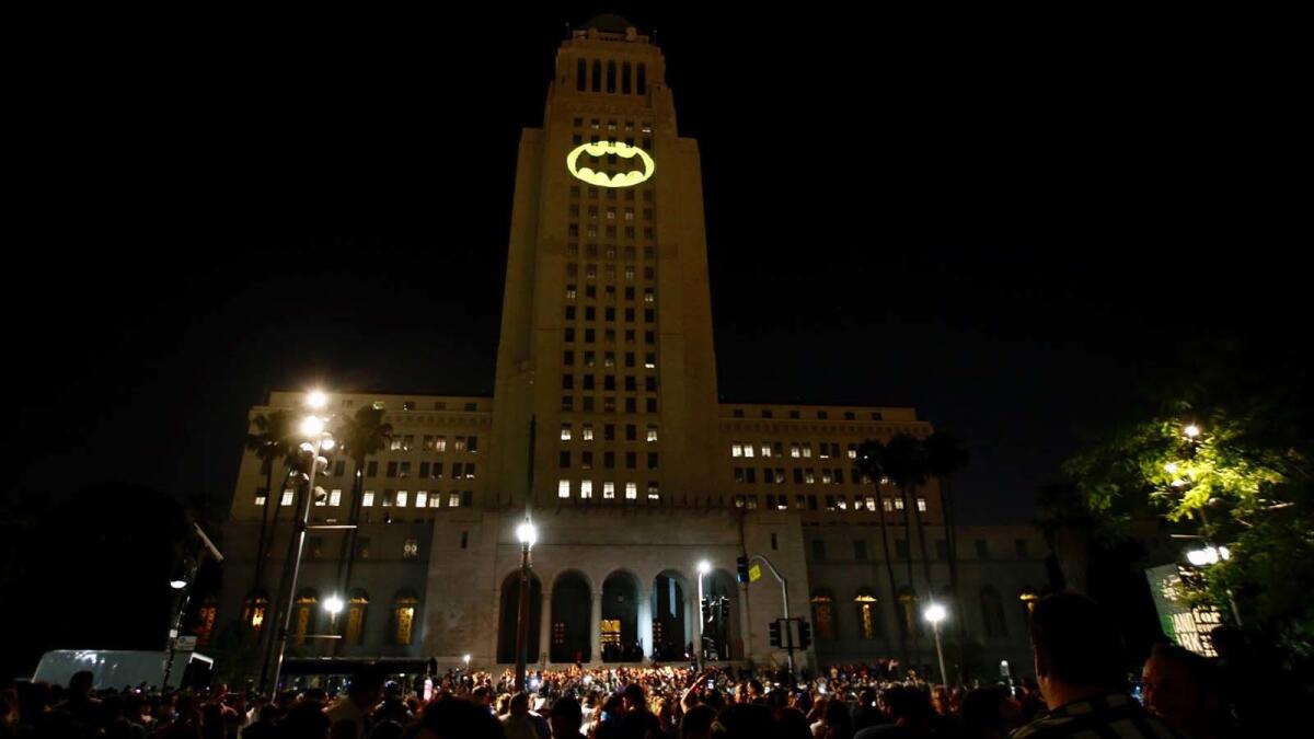 The Bat signal is projected onto Los Angeles City Hall on Thursday night to honor Adam West.