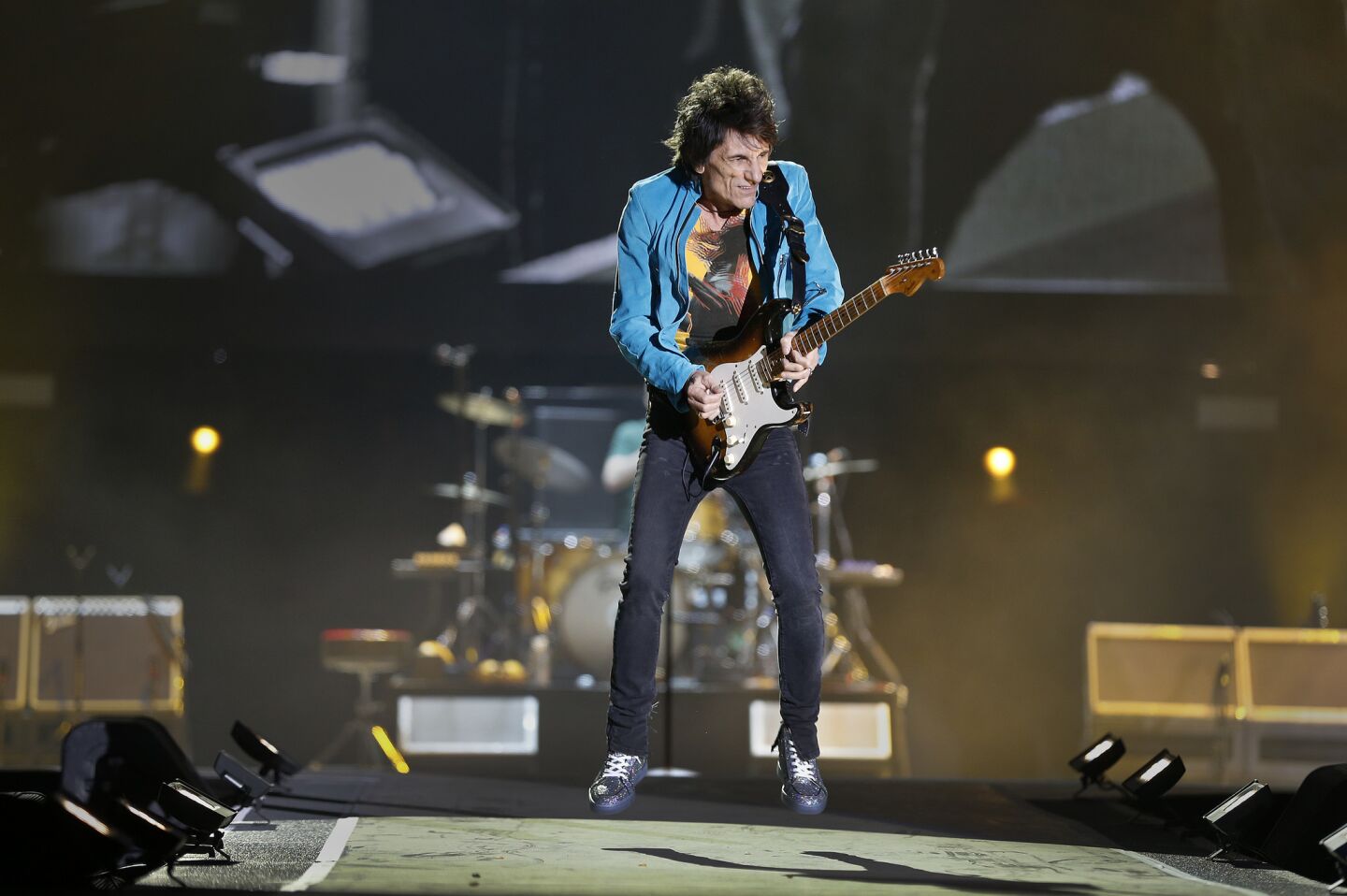 Guitarist Ron Wood of the Rolling Stones performs on the first night of Desert Trip at the Empire Polo Club grounds in Indio.