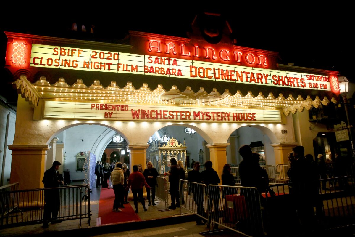 A line of people wait to enter the Arlington Theatre during a previous Santa Barbara International Film Festival
