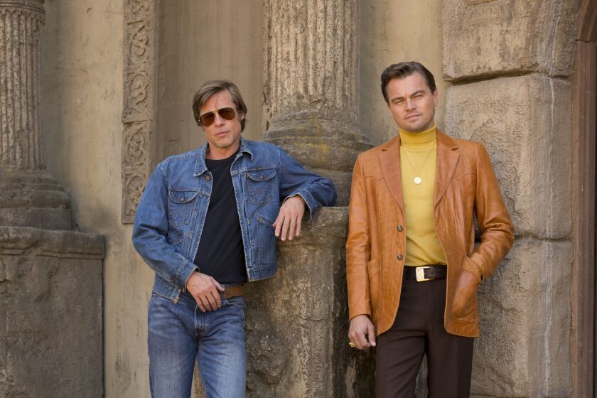 (L-R)- Brad Pitt and Leonardo DiCaprio star in Columbia Pictures ÒOnce Upon a Time in Hollywood." Credit: ANDREW COOPER/Columbia Pictures