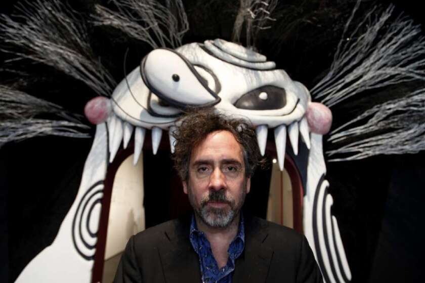 Tim Burton at the entrance to his exhibition at the Los Angeles County Museum of Art in 2011. The popular exhibition is heading to Seoul.