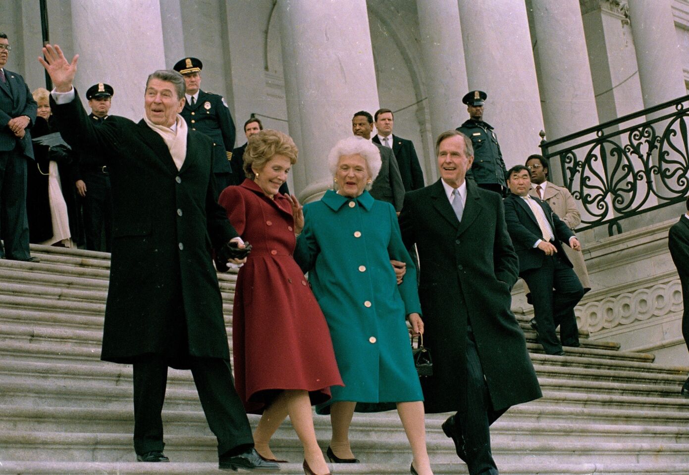 Former President Ronald Reagan, Nancy Reagan, First Lady Barbara Bush and President George H.W. Bush walk down the Capitol steps after Bush's inauguration ceremony on Jan. 20, 1989.