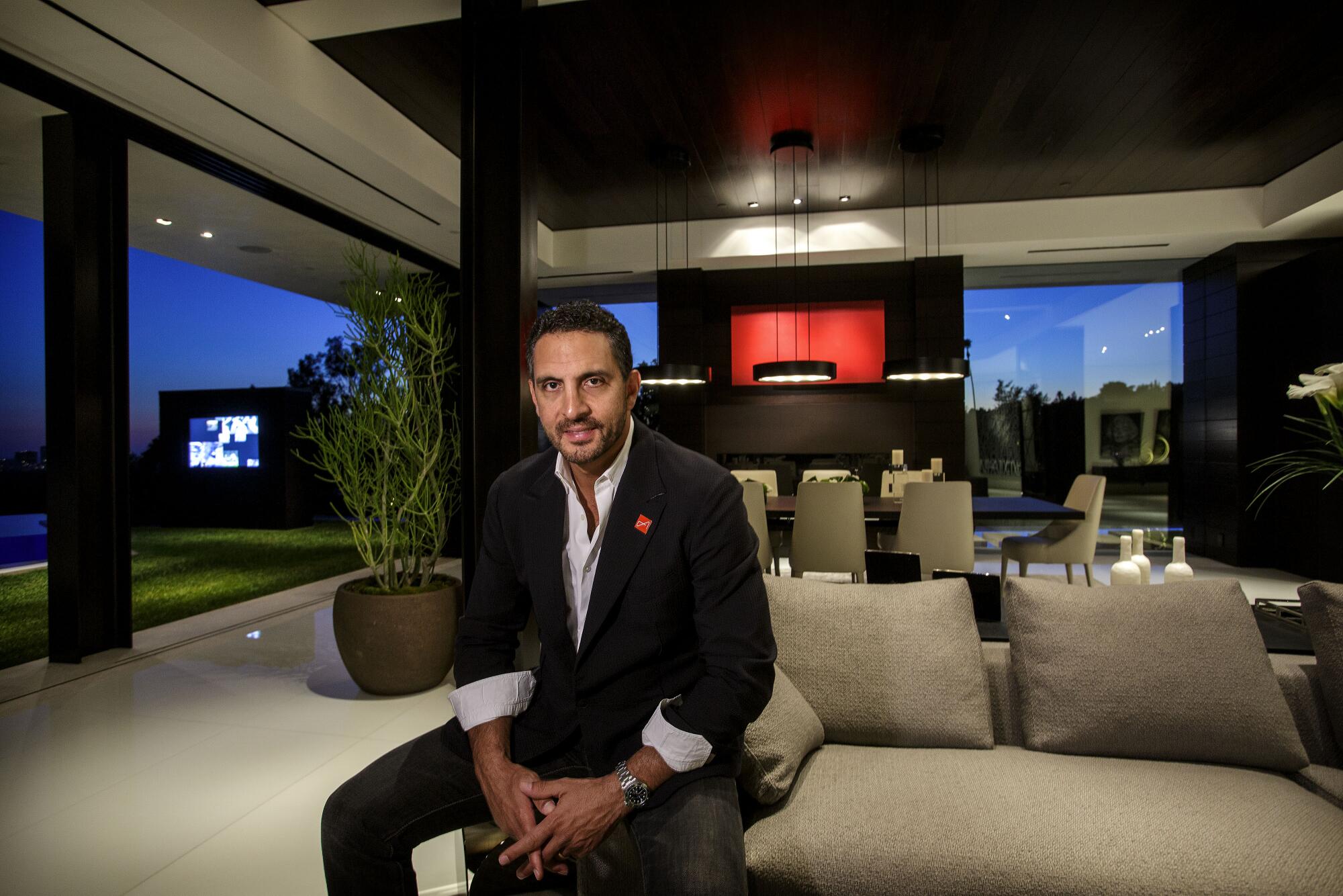 Mauricio Umansky poses inside a $36-million Beverly Hills home in 2013.