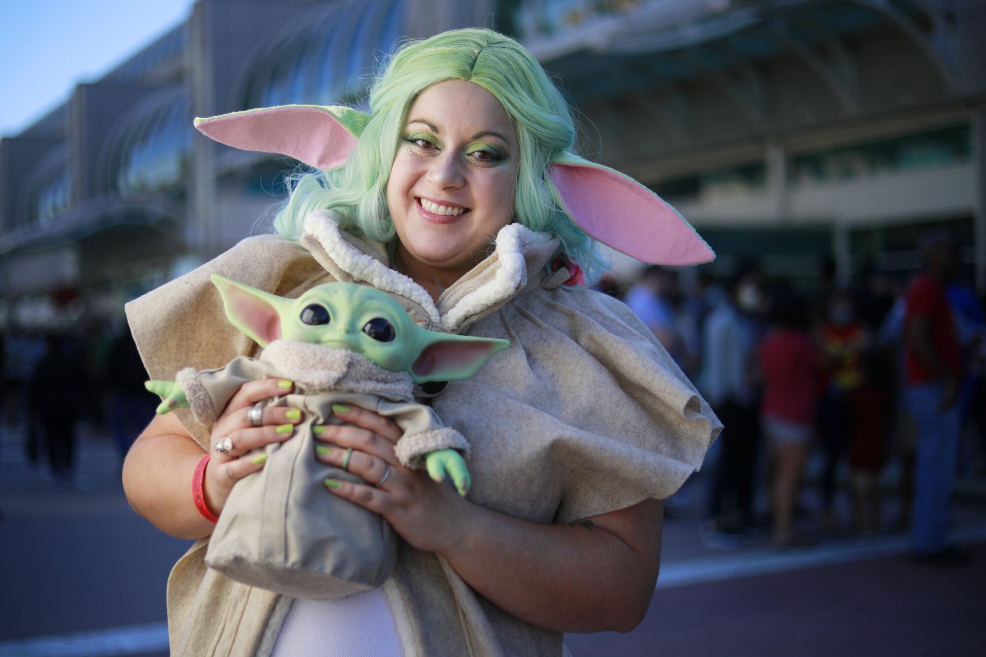 Larissa Galarza of San Diego dressed as Baby Yoda at Comic-Con Special Edition.