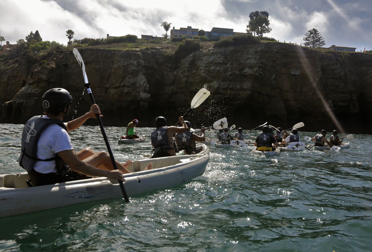 Paddlers at the San Diego-La Jolla Underwater Park take a guided tour.