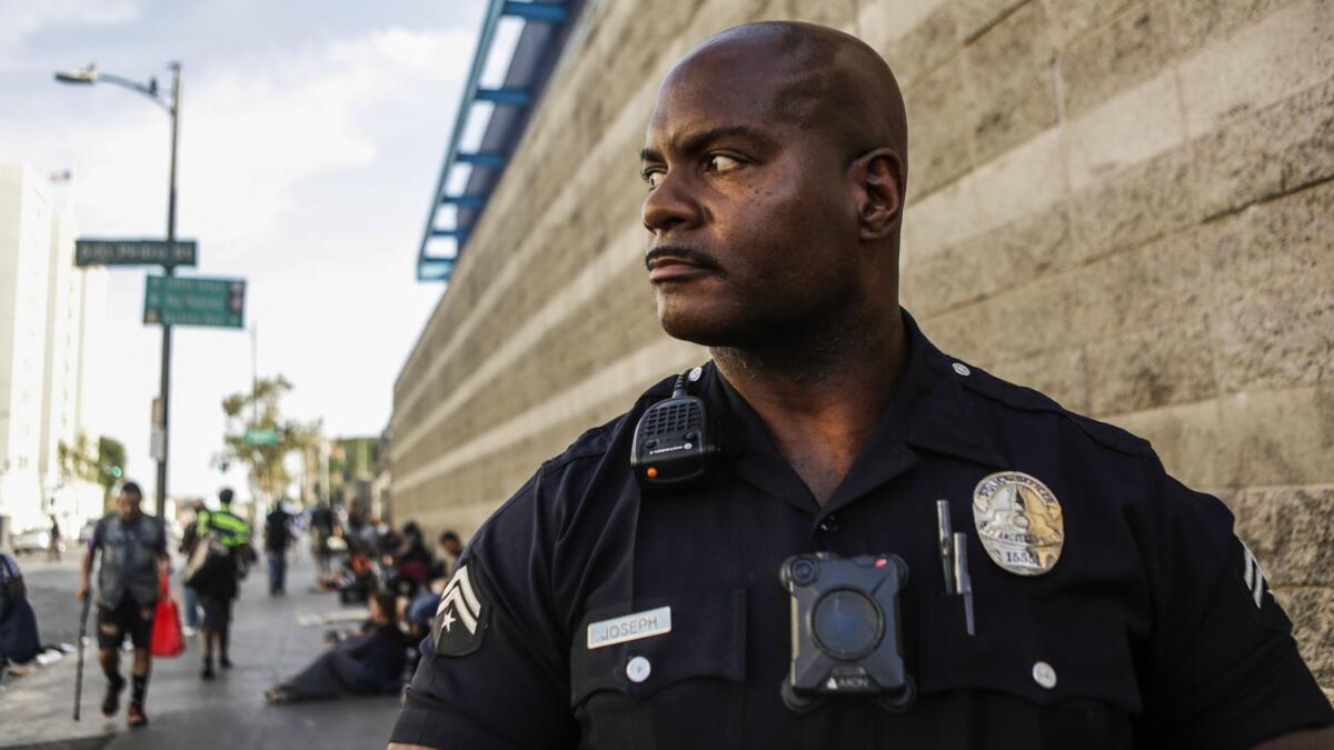 Officer Deon Joseph said petition signature scams pop up periodically on skid row, where he is the LAPD's senior lead officer.