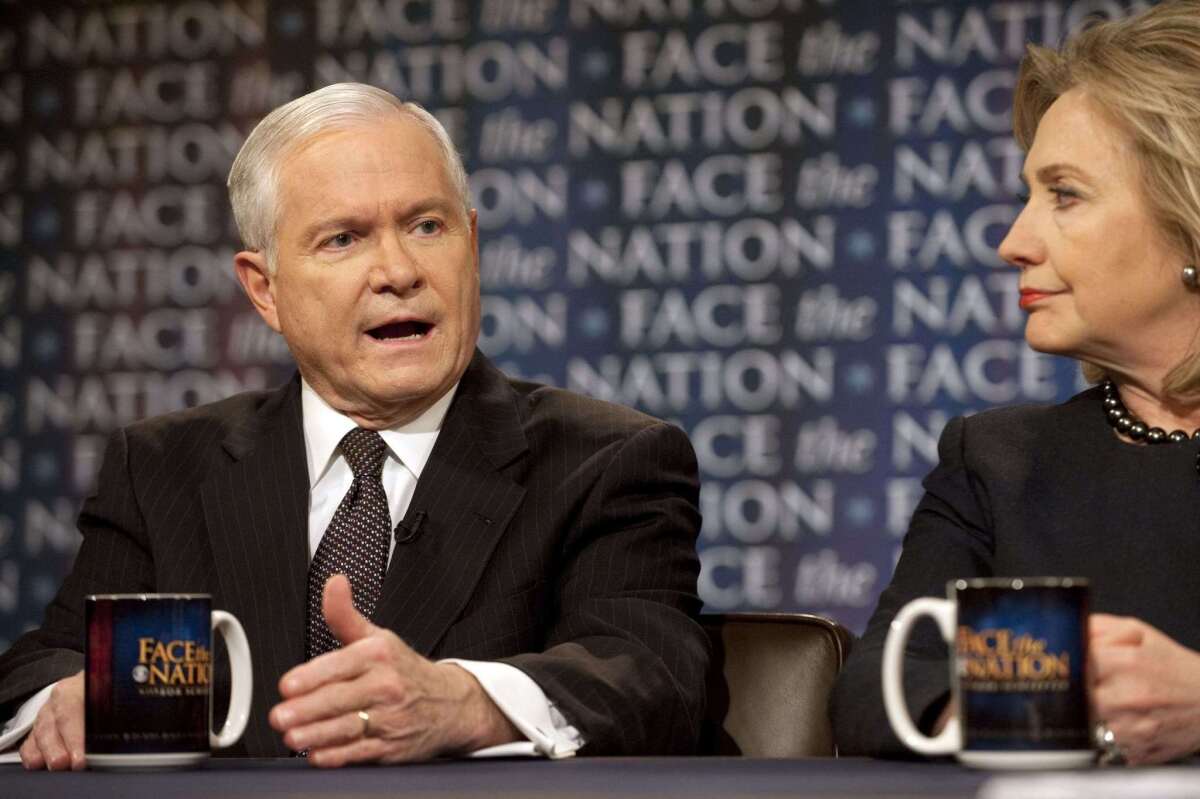 Then-Secretary of Defense Robert Gates, with then-Secretary of State Hillary Rodham Clinton, discusses the latest developments in the Middle East during an interview on CBS' "Face the Nation" in 2011.