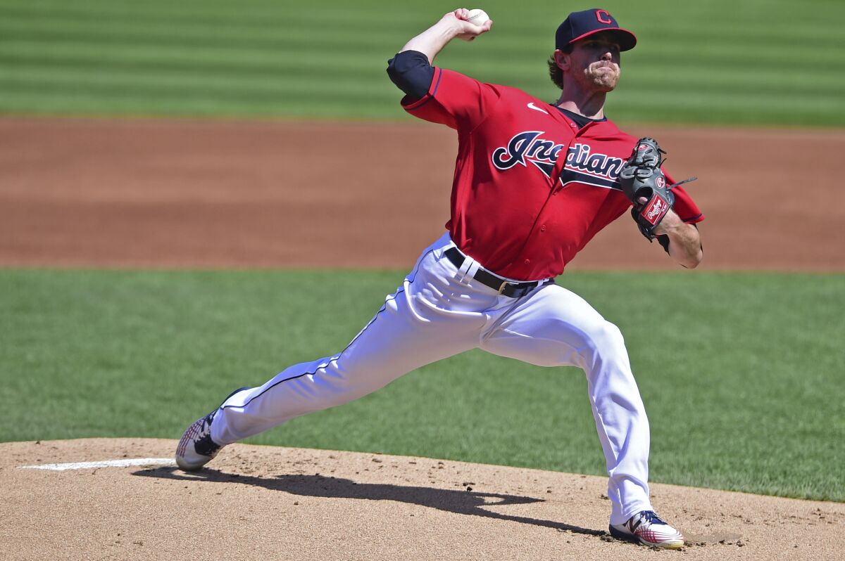 Cleveland Indians starting pitcher Shane Bieber delivers during the first inning of a baseball game against the Milwaukee Brewers, Sunday, Sept. 6, 2020, in Cleveland. (AP Photo/David Dermer)