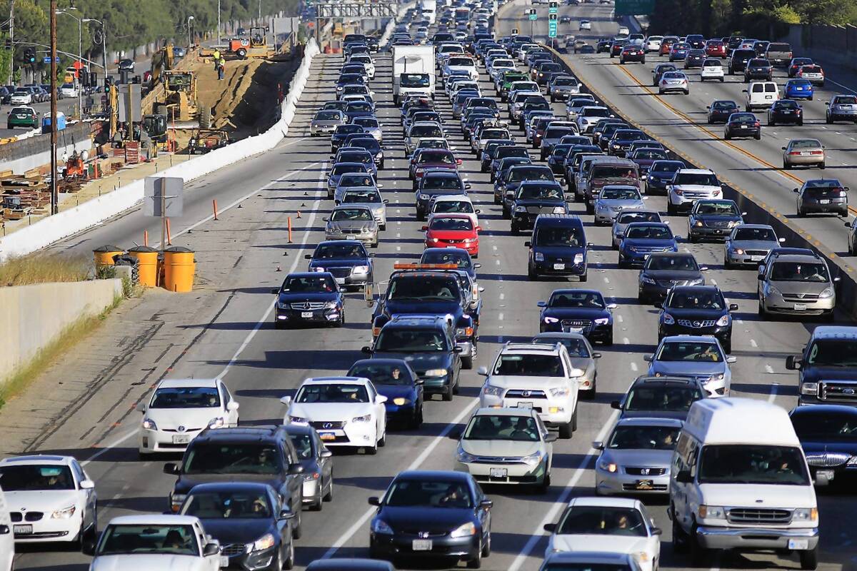 Traffic crawls along the northbound 405 Freeway in Westwood. The Los Angeles County Metropolitan Transportation Authority has said the construction project will take at least a year longer than originally planned.