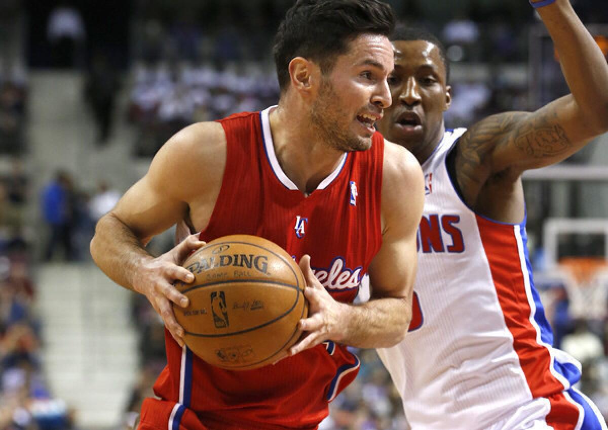 Clippers guard J.J. Redick drives against Pistons guard Kentavious Caldwell-Pope during a game last month in Auburn Hills, Mich.