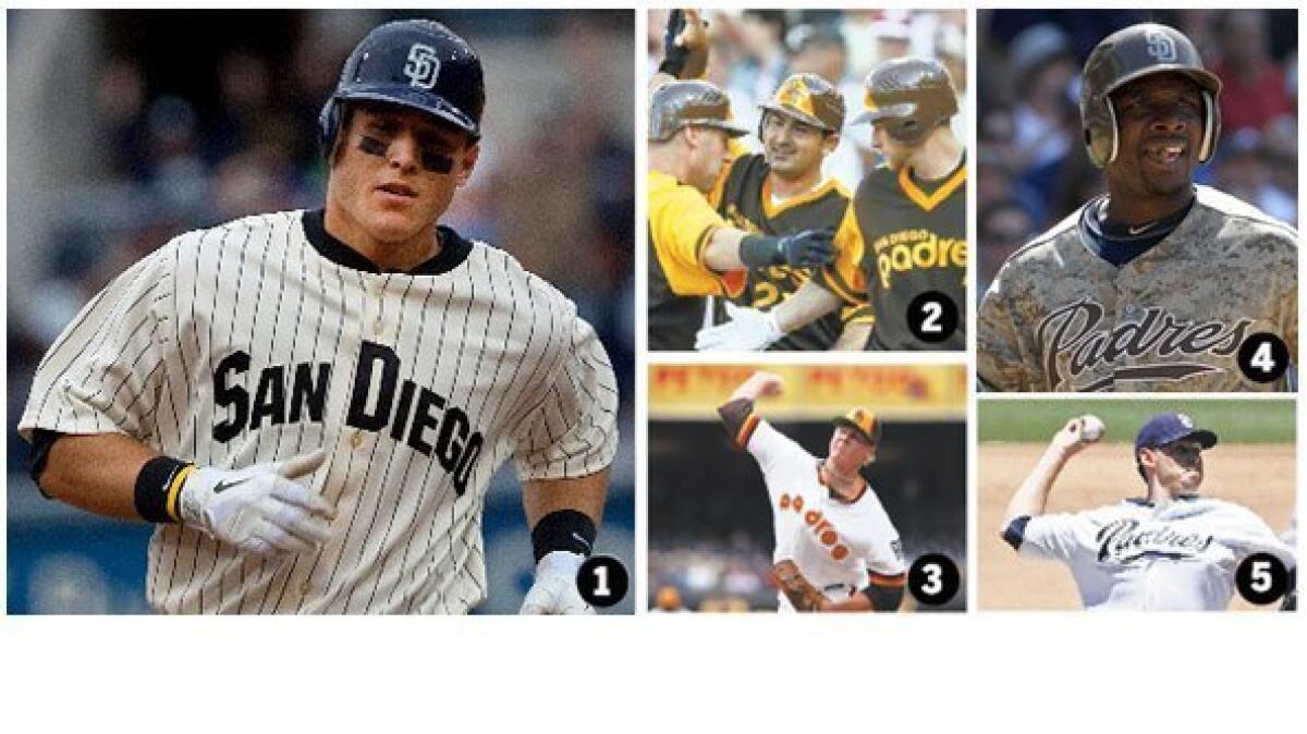 1. Anthony Rizzo wearing the 1936 retro uniform. 2. Adrian Gonzalez celebrates with Ryan Ludwick and Chase Headley in 1978 mustard and brown. 3. Mat Latos dons the NL Champion uniform of 1984. 4. Orlando Hudson in Sunday camouflage. 5. Tim Stauffer dons home whites.