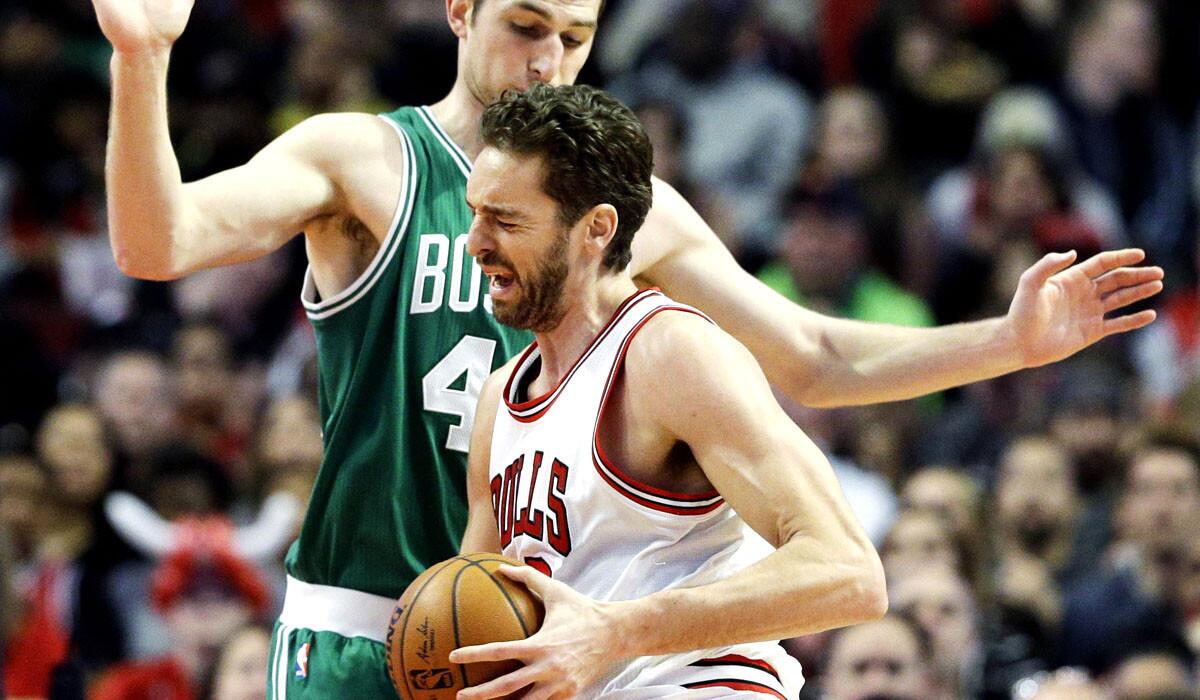 Bulls center Pau Gasol drives against Celtics center Tyler Zeller in the first half Saturday night.