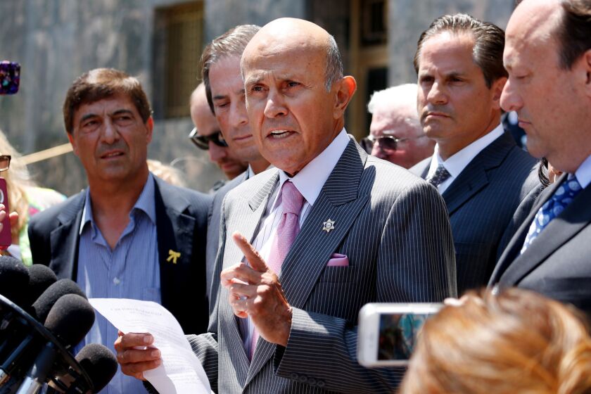 Former Los Angeles County Sheriff Lee Baca makes a statement announcing the withdrawal of his guilty plea.