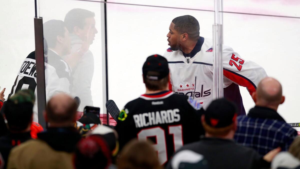 Washington right wing Devante Smith-Pelly argues with Chicago Blackhawks fans from the penalty box on Feb. 17.