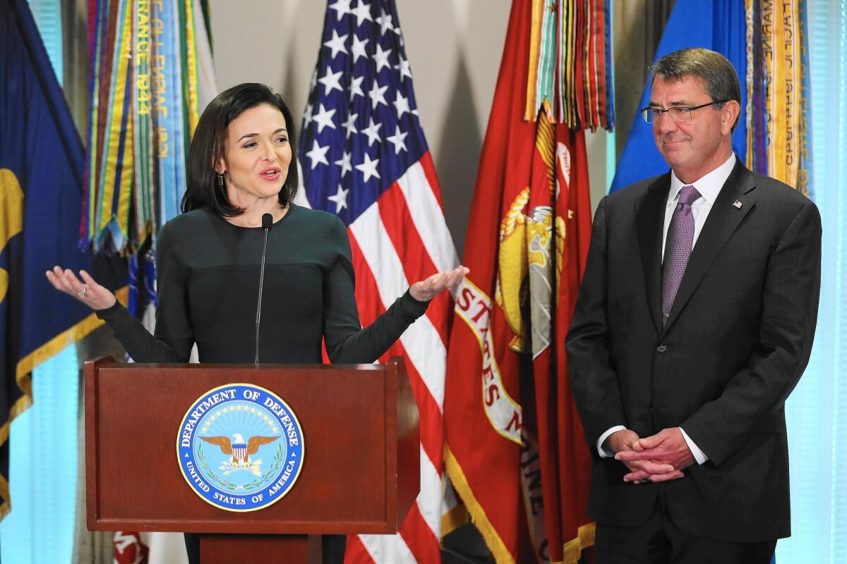 Facebook's Sheryl Sandberg, left, and U.S. Defense Secretary Ashton Carter address female members of the military at the Pentagon.