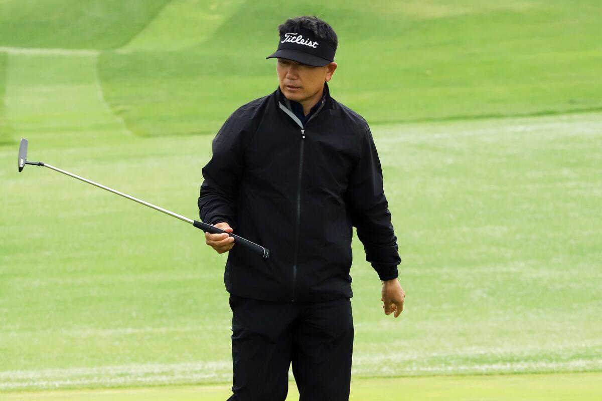 Y.E. Yang of South Korea makes a putt during the Hoag Classic at Newport Beach Country Club on Saturday.