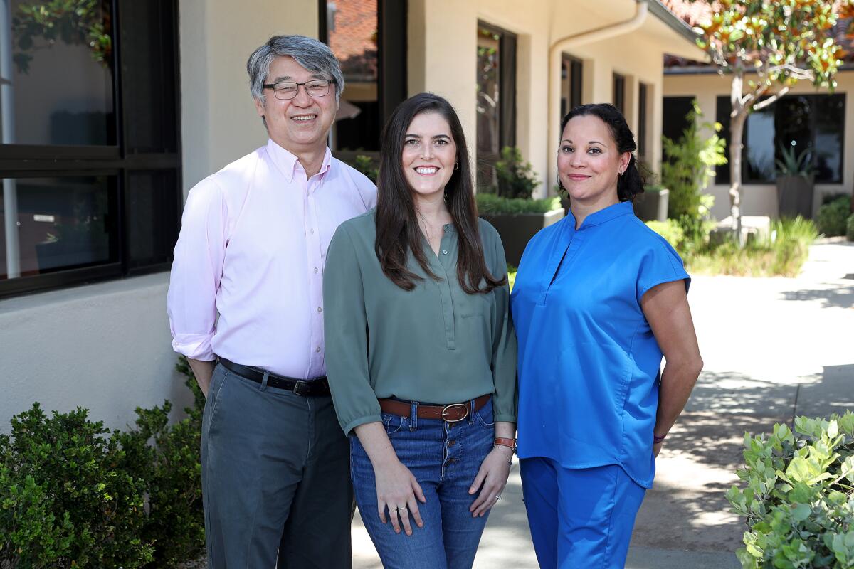 Dr. David Liang, from left, Kaitlin Jones and Megan Boeglin, clinical nurse navigator for Hoag Aortic Center, on Friday. 