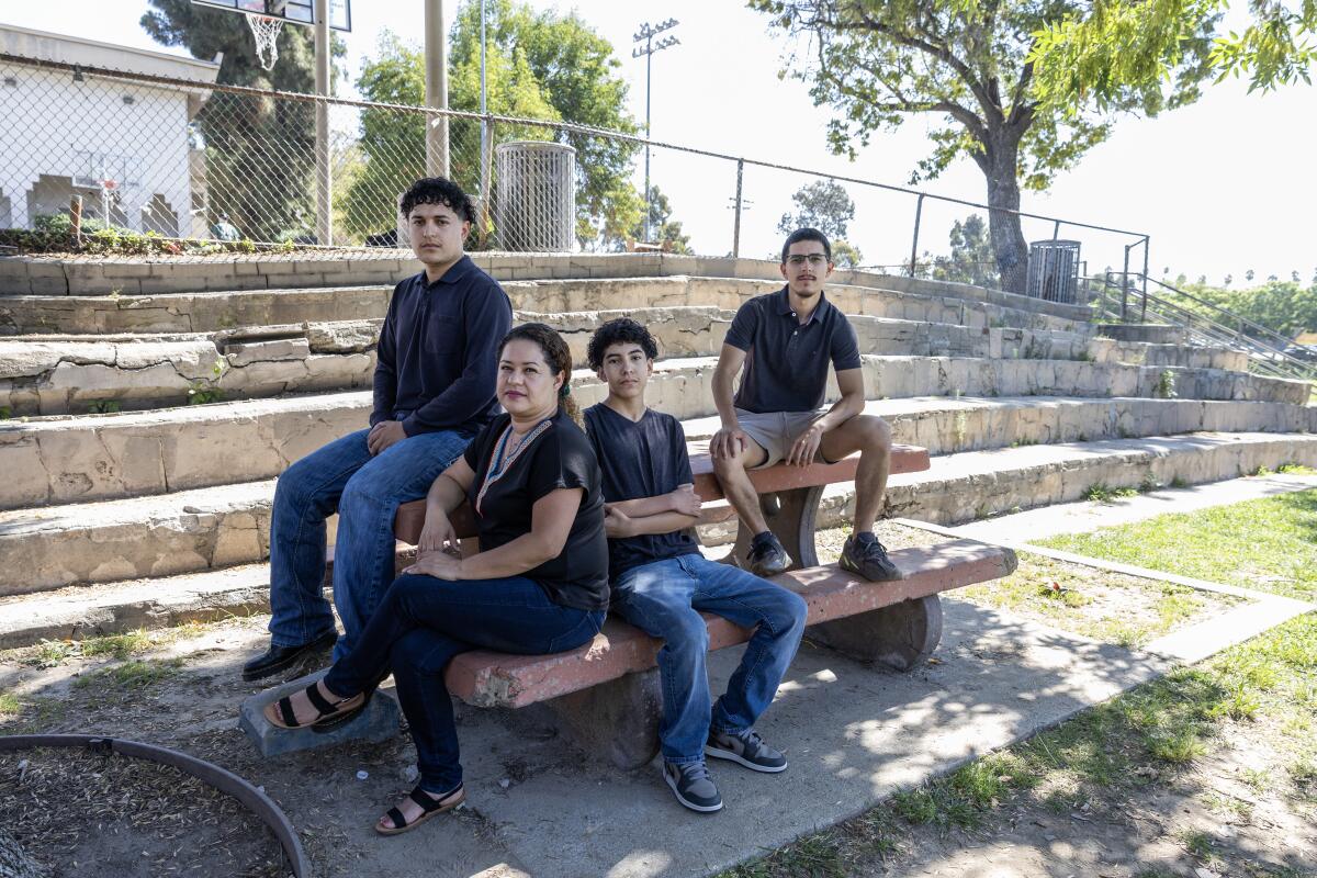 Celenia Gutierrez and her children Anthony Sanchez, 19, left, Brandon Sanchez, 13 and Christopher Sanchez, 24, 