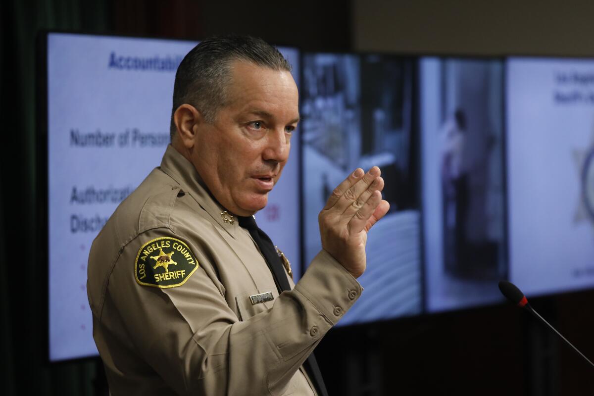 Los Angeles County Sheriff Alex Villanueva speaks during a news conference.