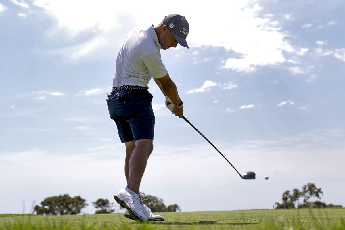 Eric Cole plays his shot from the 12th tee during a practice round of the U.S. Open Golf Championship, Tuesday, June 15, 2021, at Torrey Pines Golf Course in San Diego. (AP Photo/Jae C. Hong)