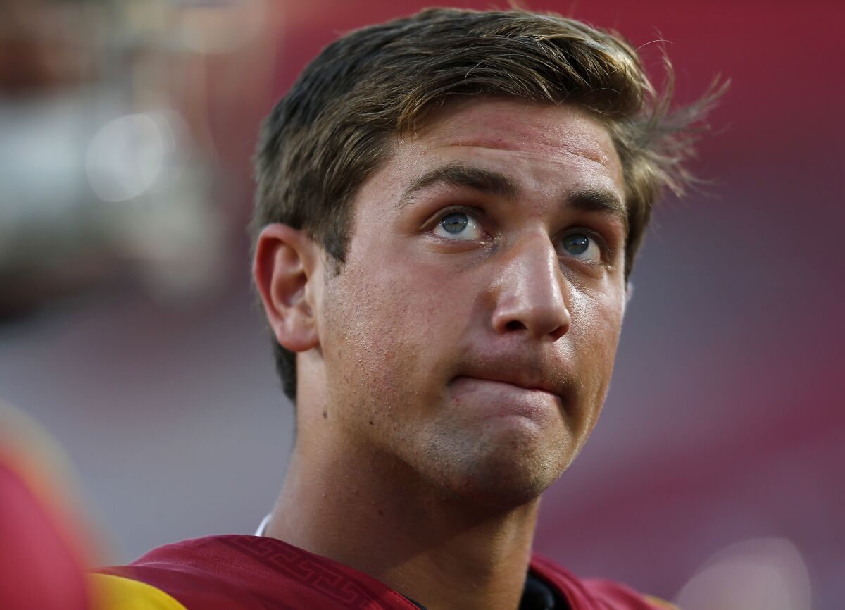 USC quarterback Kedon Slovis warms up before a game against Stanford.