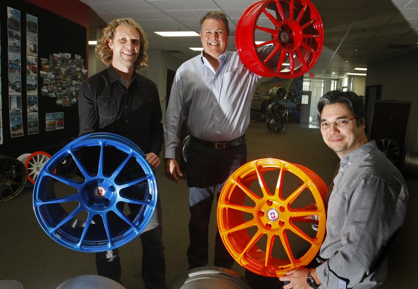 From left, Patrick Moran, creative director; Chris Luhnow, chairman and CEO; and Alan Peltier, president, in the headquarters of HRE Performance Wheels.