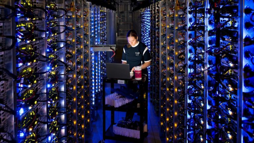 Denise Harwood diagnoses an overheated computer processor at Google's data center in The Dalles, Ore. Google uses data centers to store email, photos, video, calendar entries and other information shared by its users.