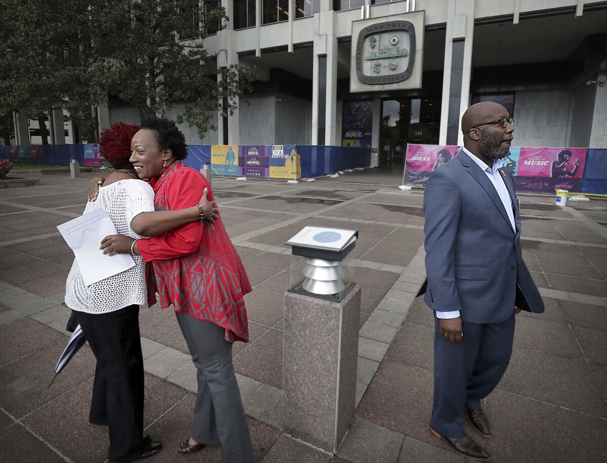 Mayoral contenders Pamela Moses, second left, and Lemichael Wilson attend a May Day Rally outside City Hall, May 1, 2019, in Memphis, Tenn. Moses, a Tennessee activist has been sentenced to six years and a day in prison after she was convicted of illegally registering to vote in 2019 while on probation for previous felonies. Some legal experts see the sentence as baffling and excessive. The district attorney's office in Memphis says Moses was sentenced on Jan. 31, 2022, by Shelby County Criminal Court Judge W. Mark Ward. (Jim Weber/Daily Memphian via AP)